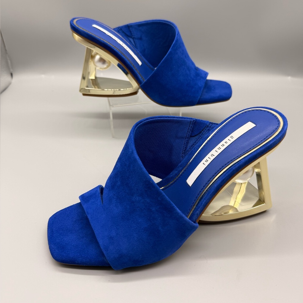 Gianni Bini Paityn suede mules in blue with a gold architectural heel.